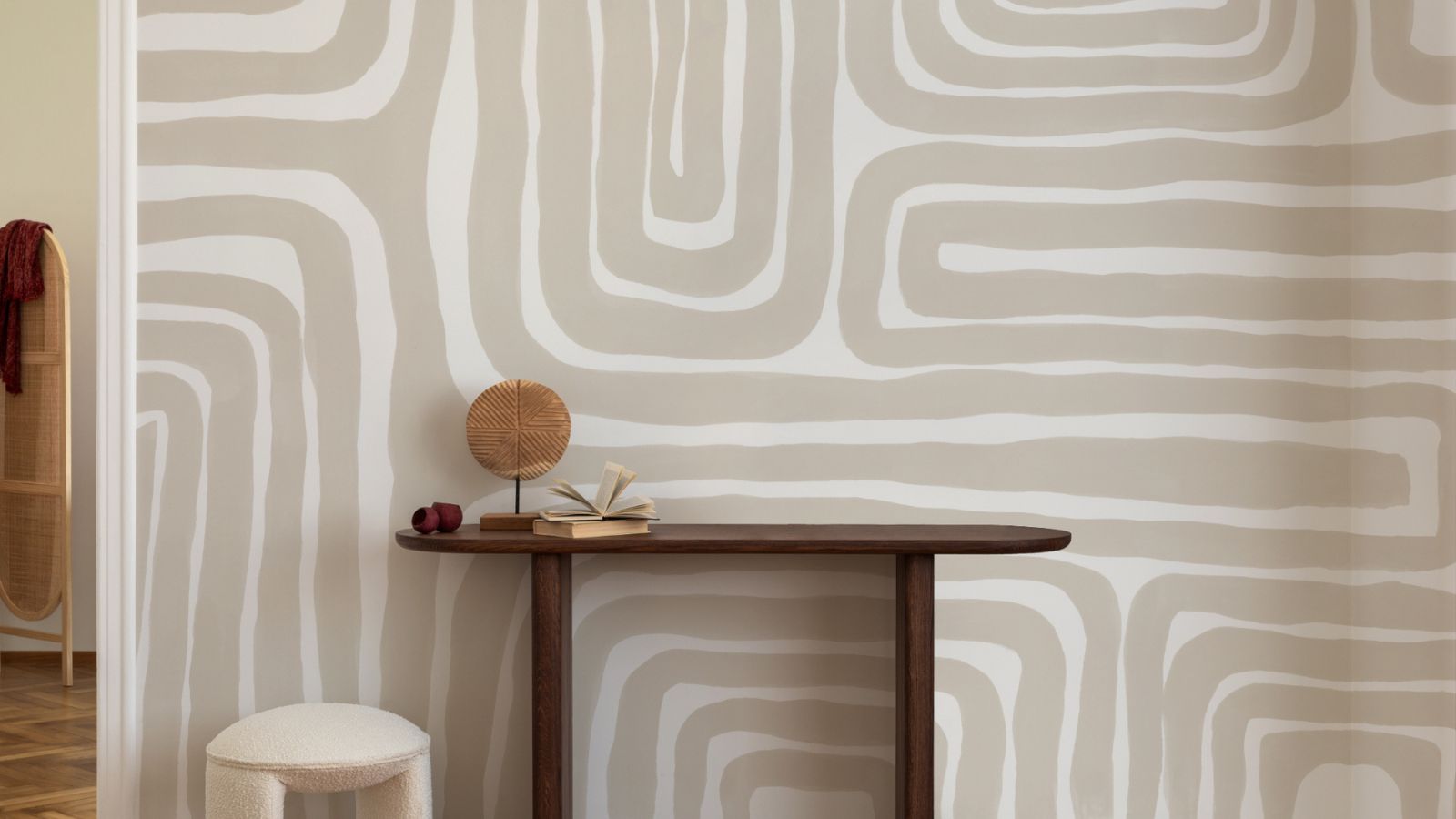 Dark botanical wallpaper in an elegant dining room